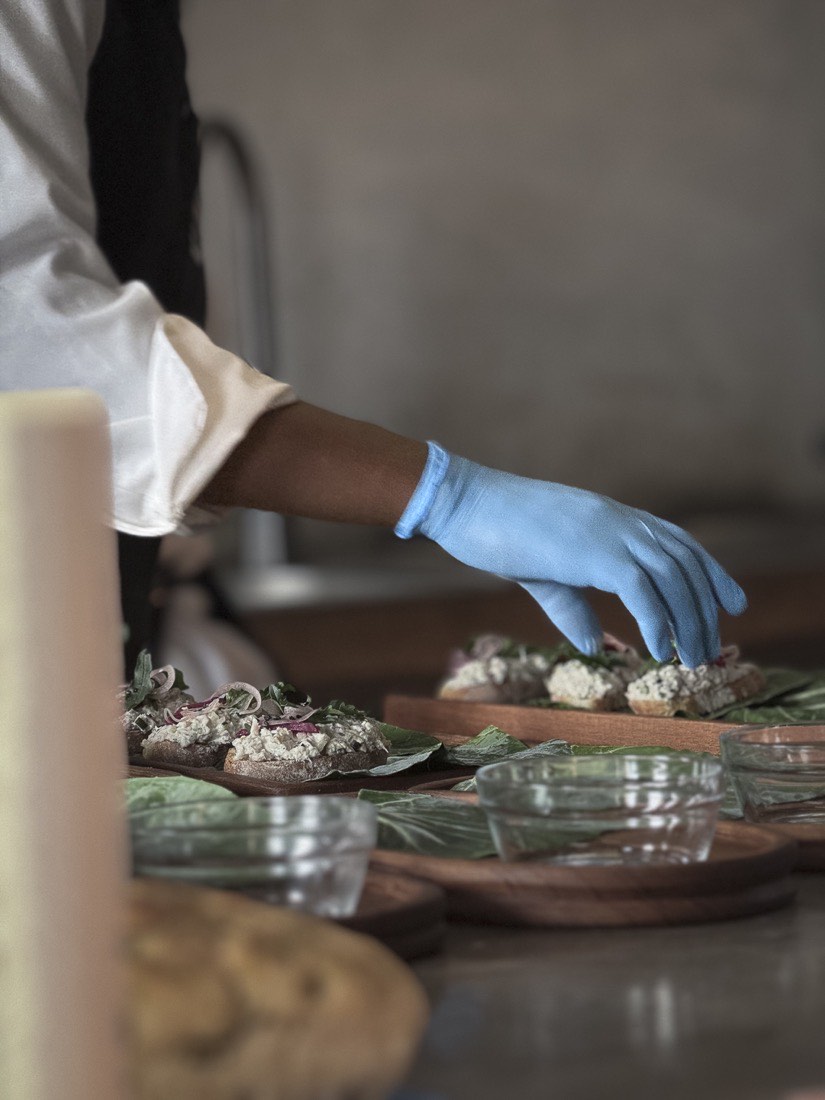 Plating in the Kinigi Table kitchen